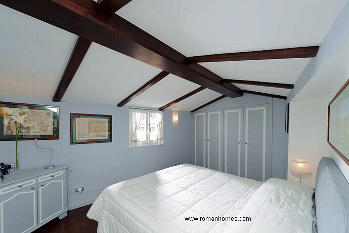 Master bedroom of the Rome Seagulls attic