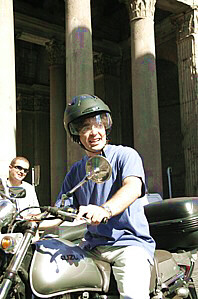 Young Roman on moped