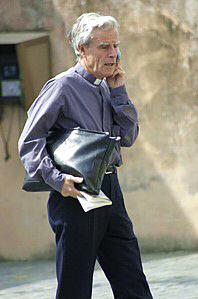 Rome priest with cell phone telefonino